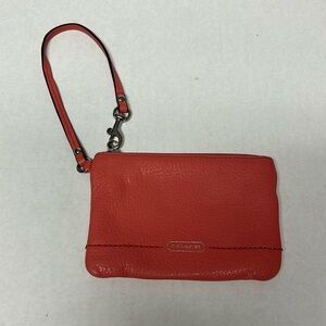 Coach park small pebbled coral leather wristlet